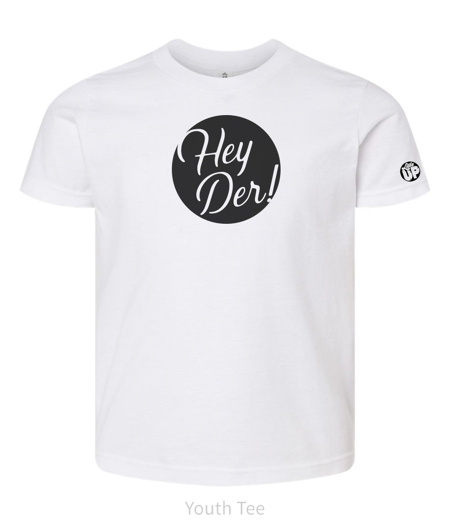 black circle with "Hey Der!" in modern script on white youth t-shirt, "Little UP" in circle small on sleeve
