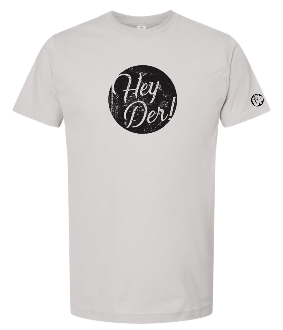 "Hey Der!" in modern textured script in black circle on light gray t-shirt