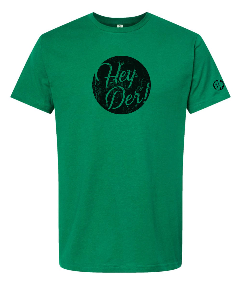 "Hey Der!" in modern textured script in black circle on green t-shirt