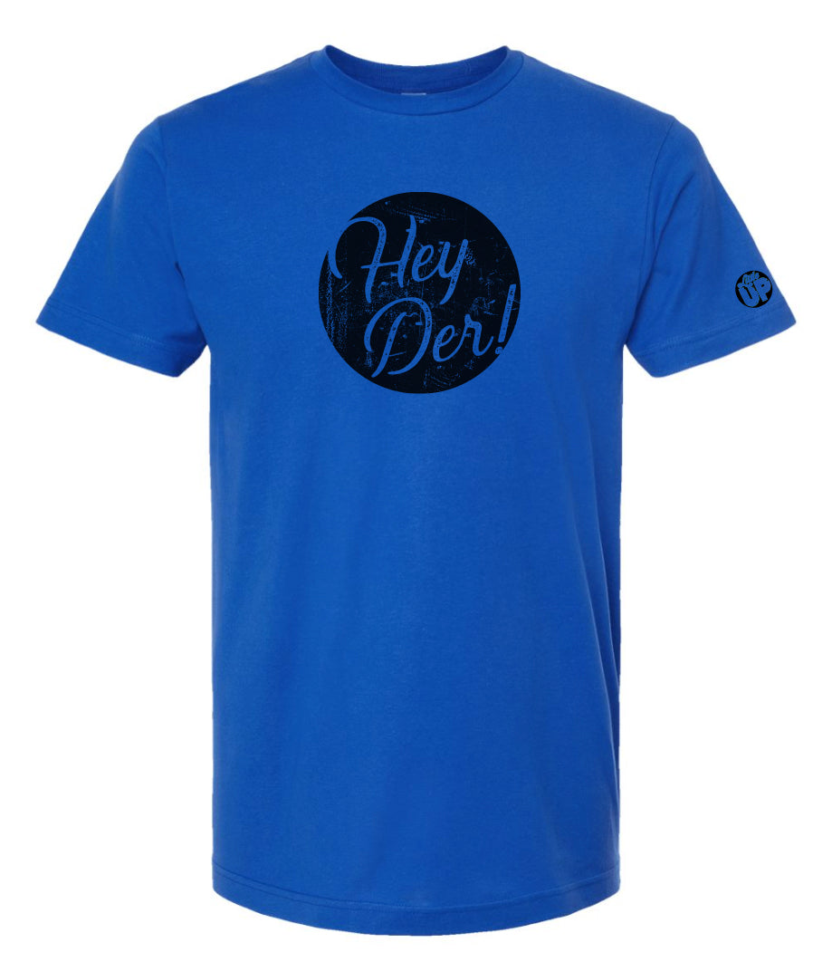 "Hey Der!" in modern textured script in black circle on royal blue t-shirt