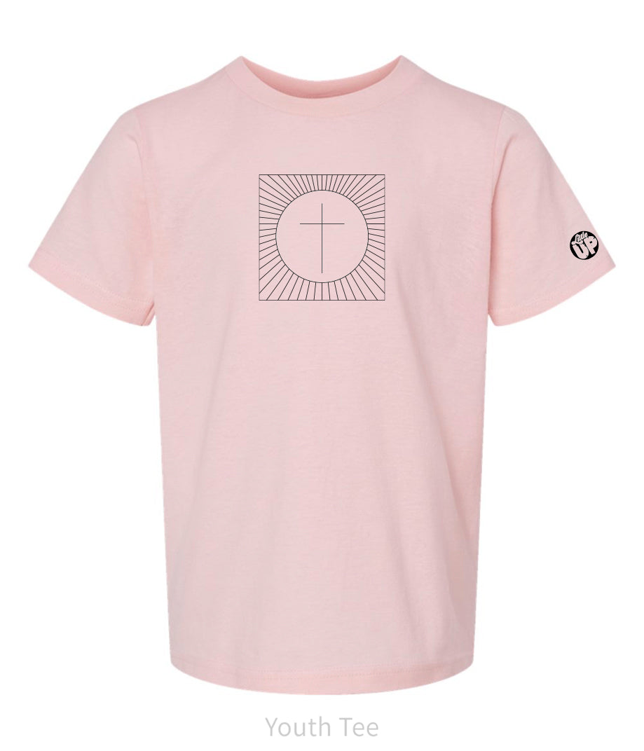 simple cross in a circle which is in a square with lines radiating from the circle to the square, printed in black on a pink t-shirt