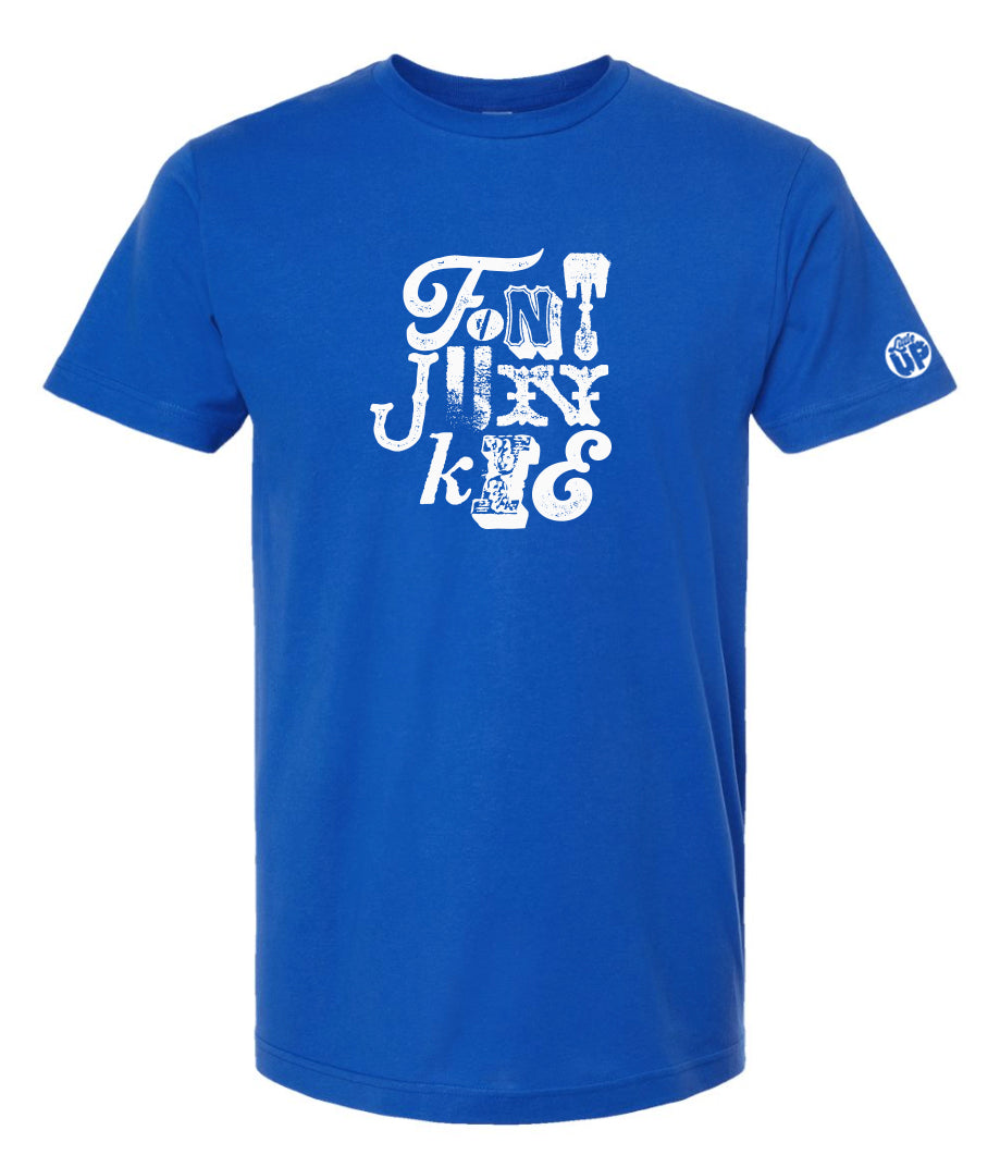 "FONT JUNKIE" in white with each letter a different font on royal blue t-shirt