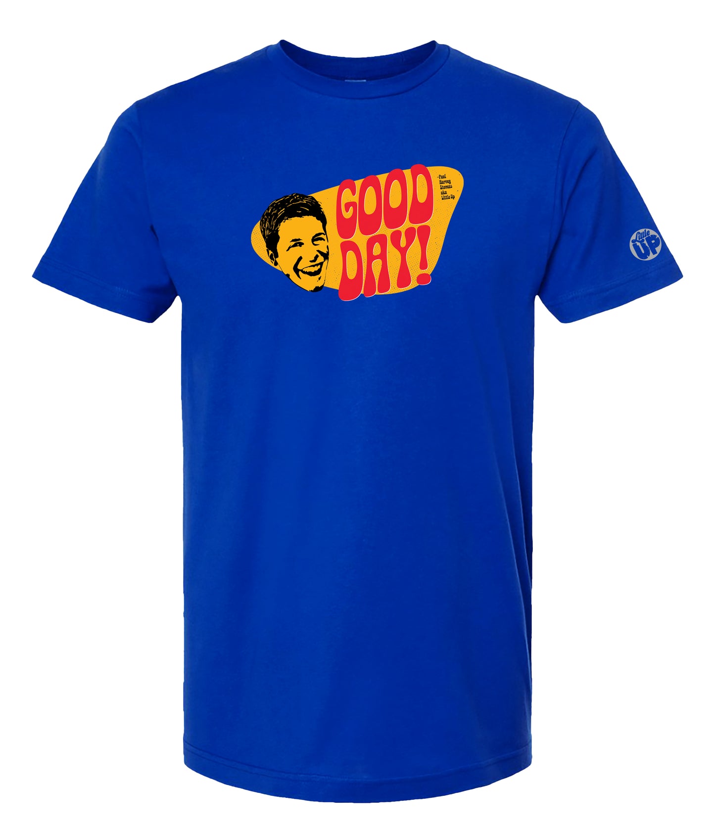 A royal blue short-sleeve crewneck t-shirt featuring a retro graphic on the chest with the text 'GOOD DAY!' in red and yellow, alongside a cartoon face illustration.