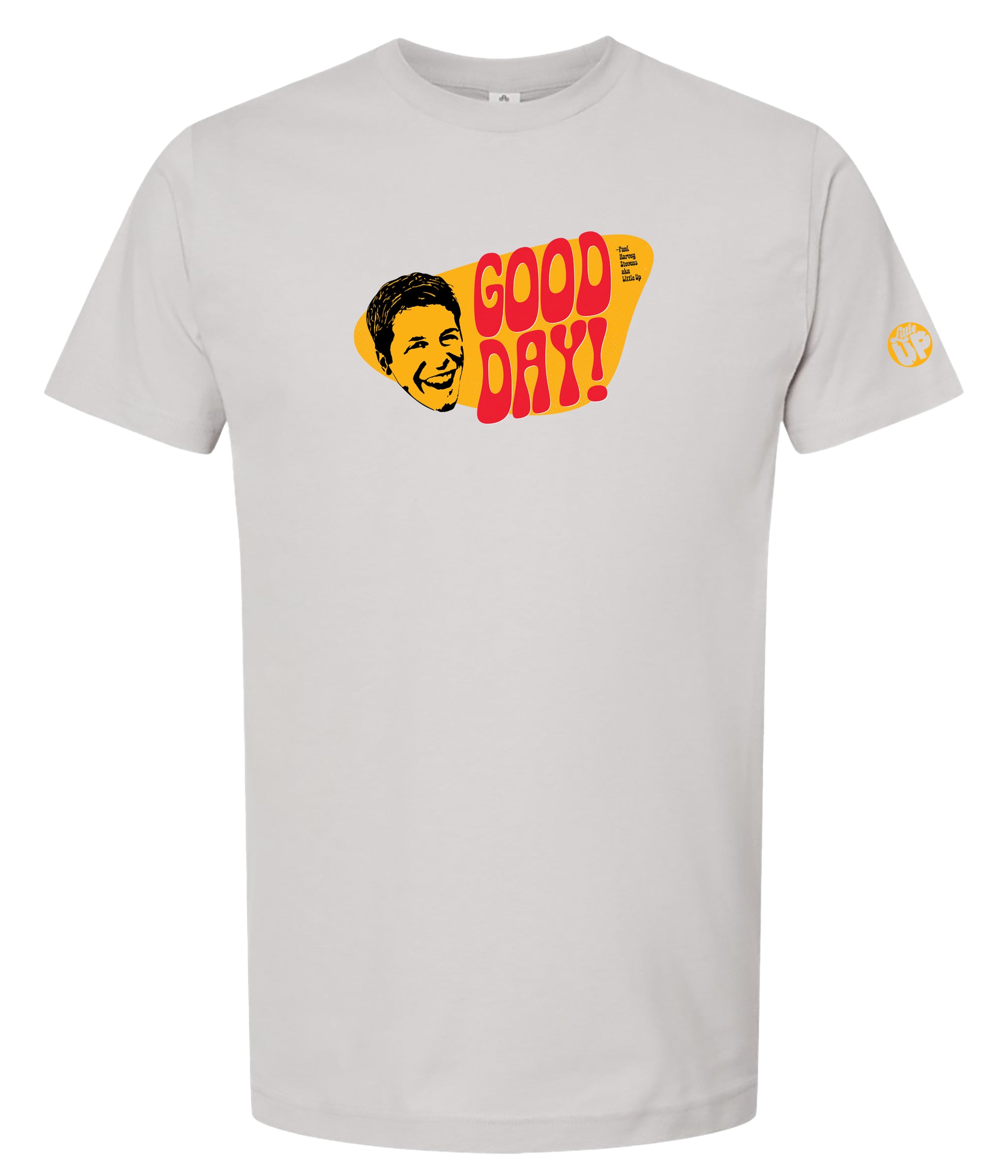 A light gray crewneck t-shirt featuring a retro graphic print on the chest with the text 'GOOD DAY!' in red and yellow, alongside a stylized yellow face illustration.