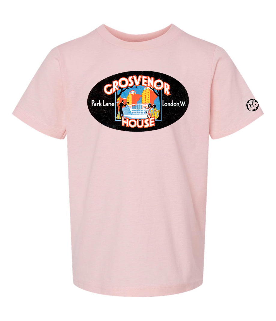 vintage oval horizontal illustration of old hotel in London, colors include red, blue, orange, teal, yellow and black, printed on pink t-shirt on white background