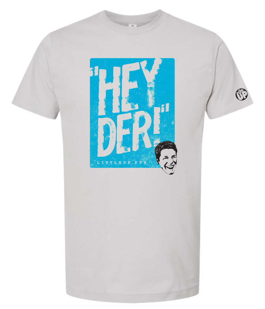 "HEY DER!" large in bright blue box with young man with big smile in the lower right corner on silver t-shirt