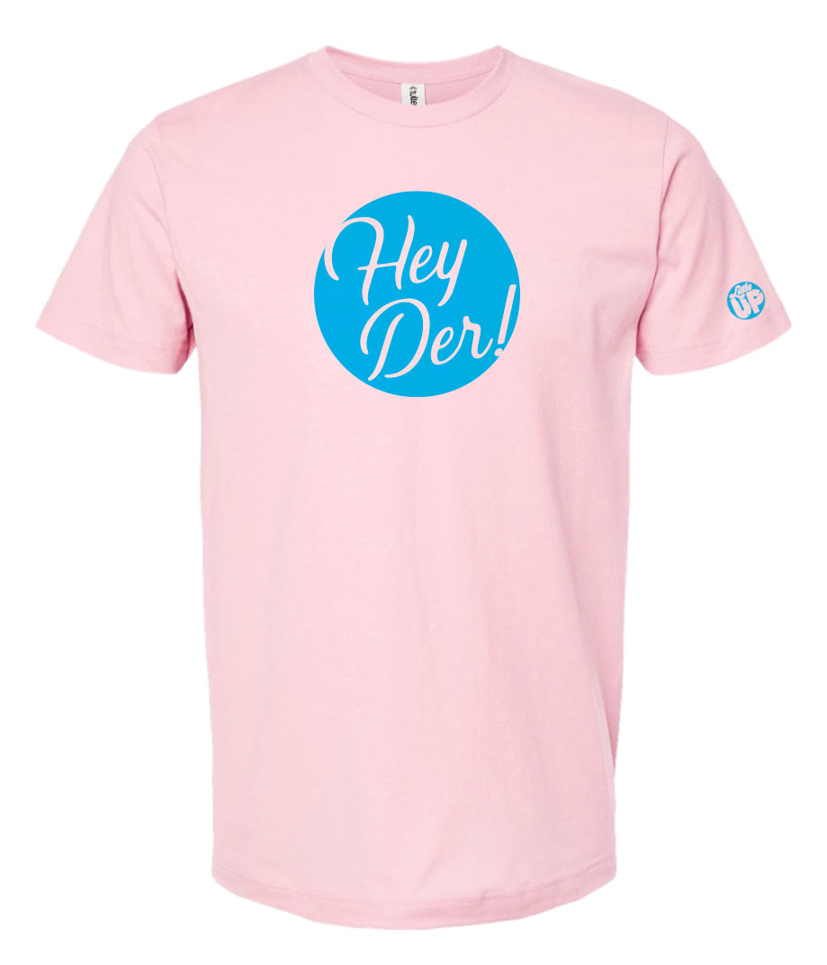 "Hey Der!" in script font, white on light blue circle, on pink t-shirt on white background