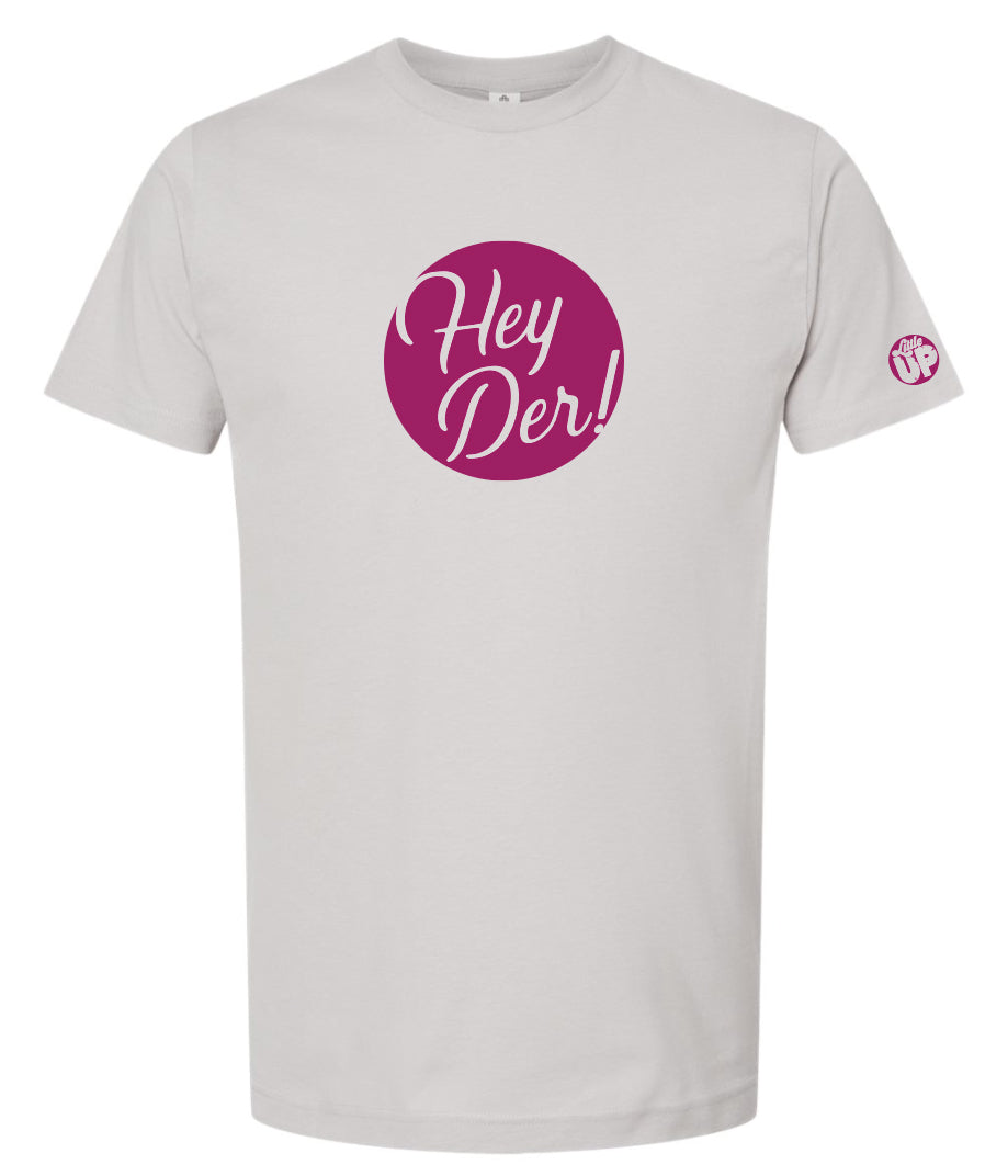 "Hey Der!" in script font, white on purple circle, on light gray t-shirt on white background