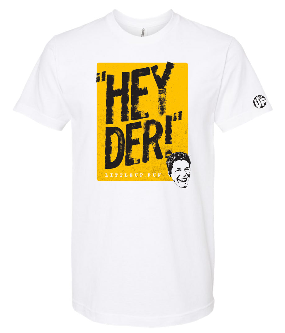 "HEY DER!" large in black on yellow box with young man with big smile in the lower right corner on white t-shirt