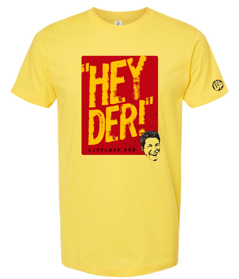 "HEY DER!" large in yellow in red box with young man with big smile in the lower right corner on yellow t-shirt