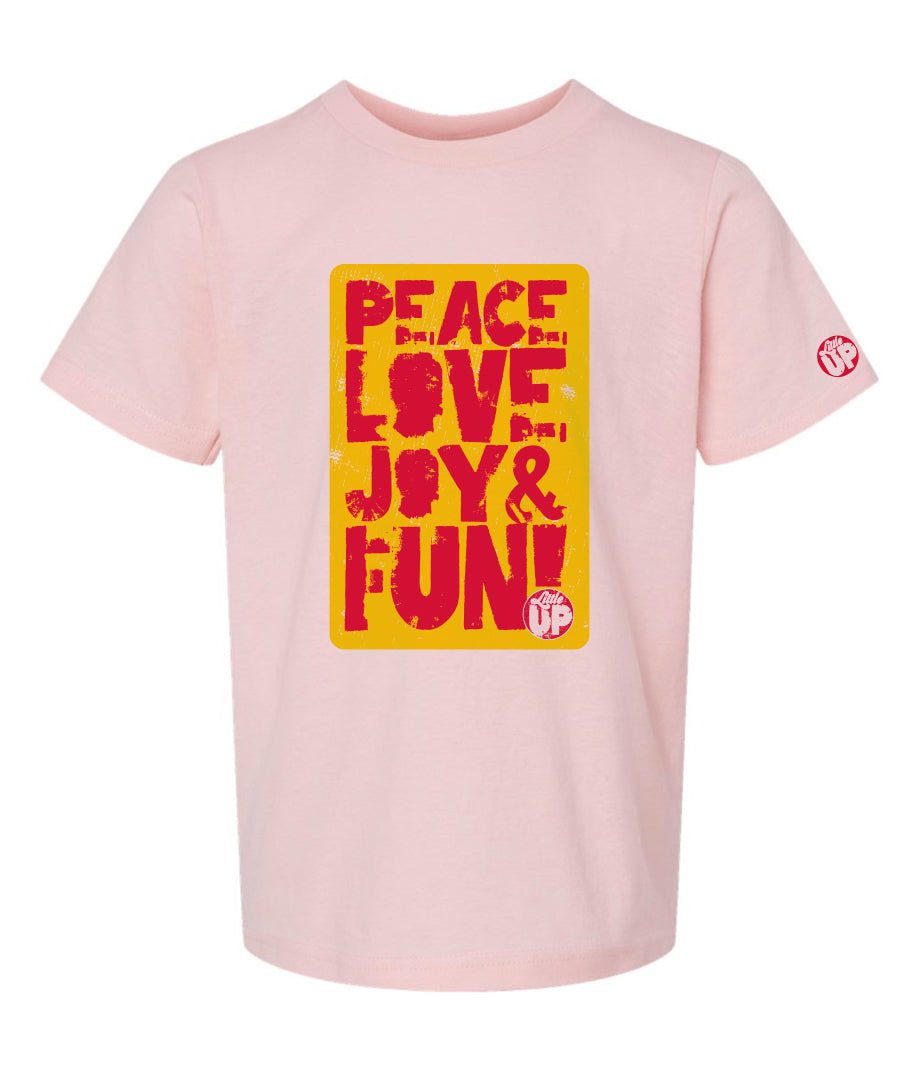 "PEACE LOVE JOY AND FUN!" in modern textured sans serif font in full color big on pink youth t-shirt on white background