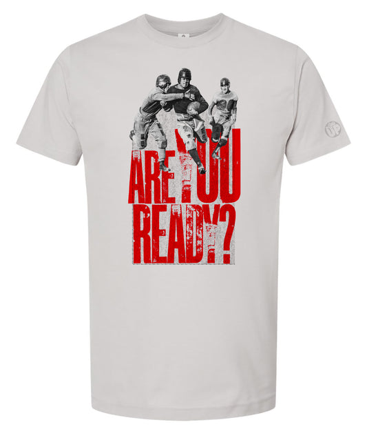 Gray t-shirt with graphic of three people and 'Are You Ready?' text on a white background