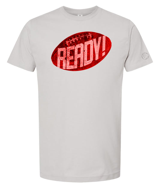 White t-shirt with a bold red football graphic, featuring the word "READY!" in distressed text. Energetic and sporty design.