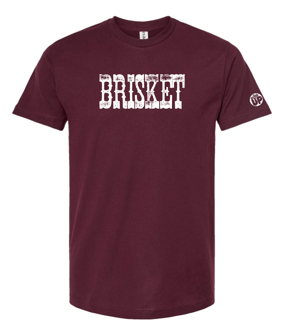 "BRISKET" in white western textured font on maroon t-shirt