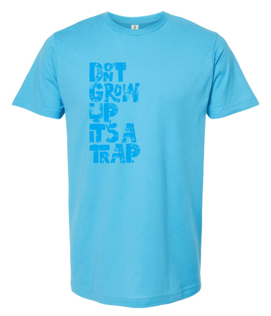 "DON'T GROW UP, IT'S A TRAP" in light blue in fun, textured font on aqua t-shirt