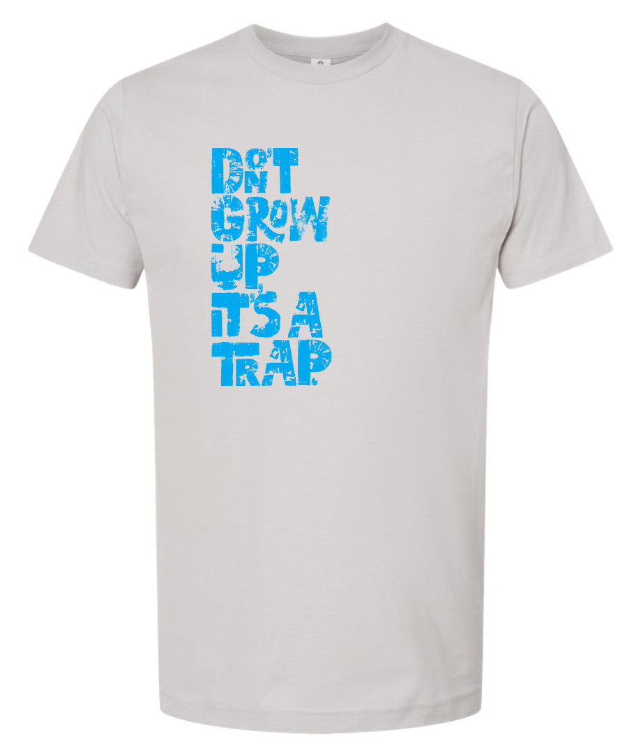 "DON'T GROW UP, IT'S A TRAP" in light blue in fun, textured font on light gray t-shirt