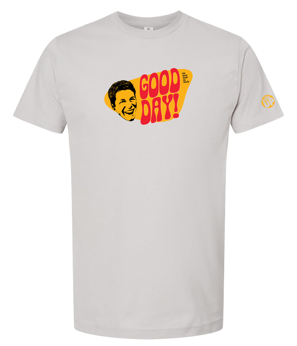 A light gray crewneck t-shirt featuring a retro graphic print on the chest with the text 'GOOD DAY!' in red and yellow, alongside a stylized yellow face illustration.