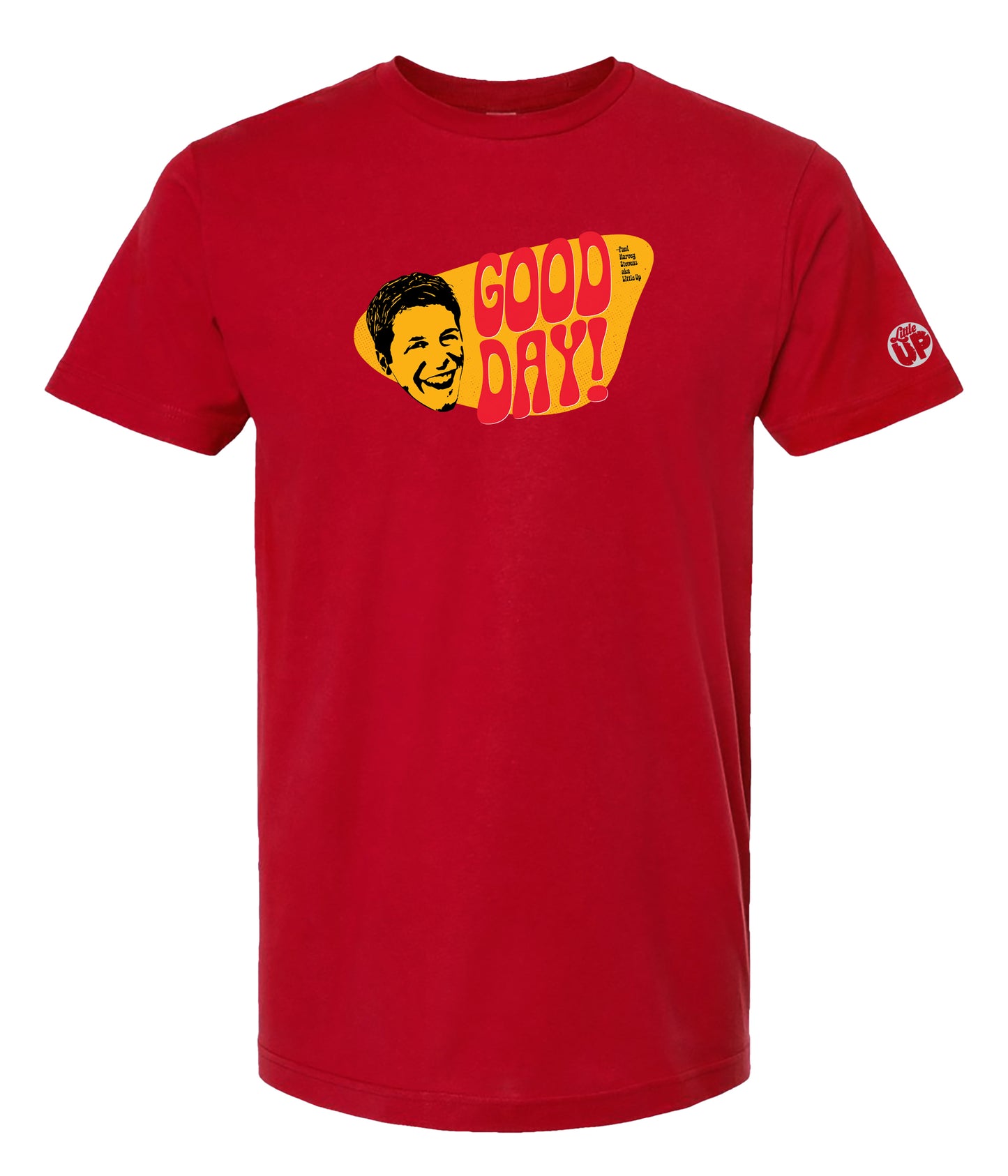 A red short-sleeve crewneck t-shirt featuring a retro graphic on the chest with the text 'GOOD DAY!' in yellow and a stylized illustrated face.