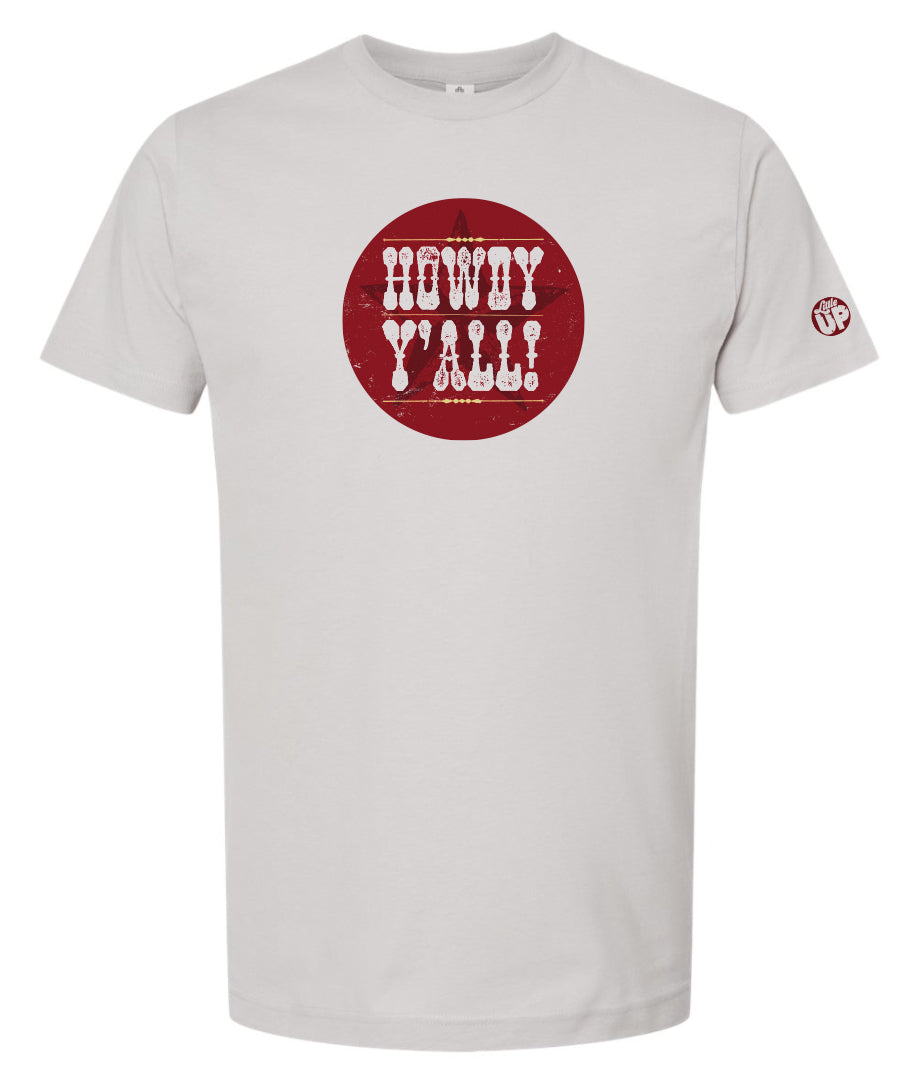 "HOWDY Y'ALL!" in textured western font on burgundy circle with subtle star overlay, on light gray t-shirt