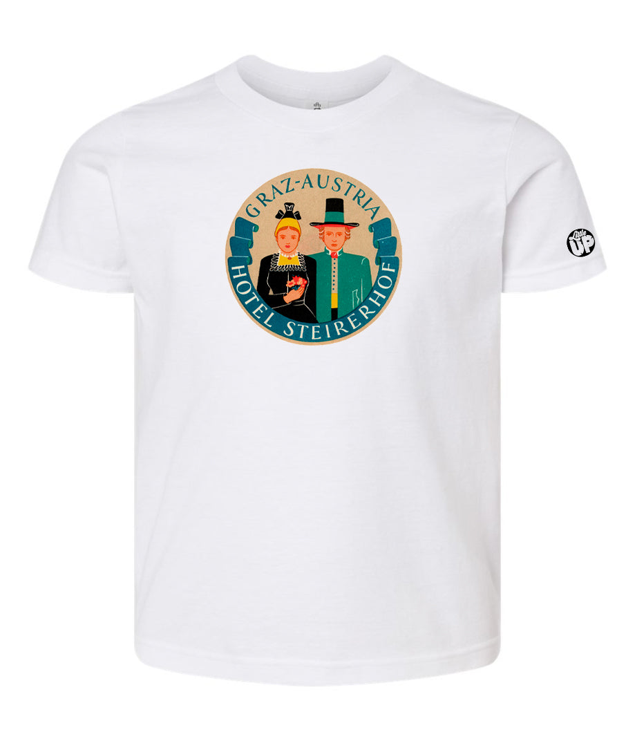 vintage round illustration of old hotel in Austria, colors include blue, orange, teal, yellow and black, printed on white youth t-shirt on white background