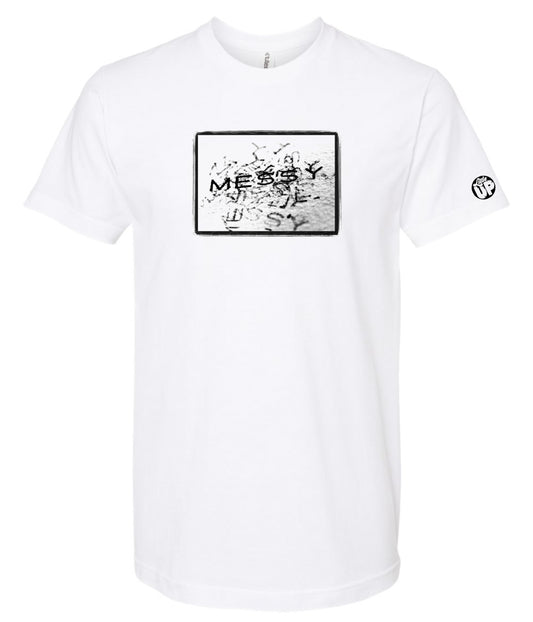 photo of "MESSY" stamped repeatedly with rough border on white t-shirt on white background