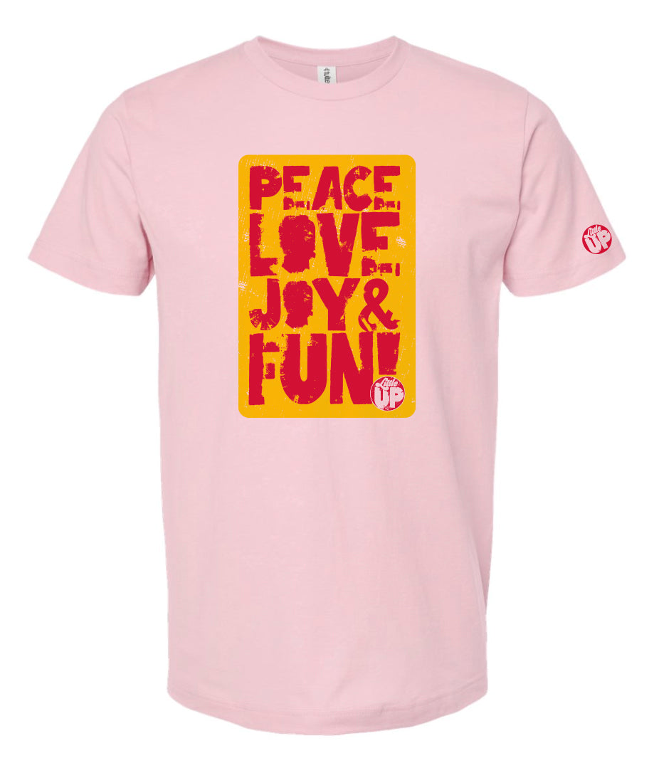 "PEACE LOVE JOY AND FUN!" in modern textured sans serif font in full color big on pink t-shirt on white background