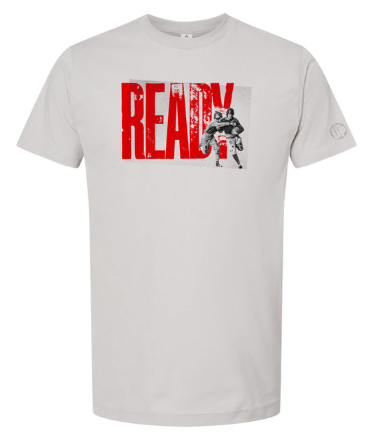 Gray t-shirt with red and black graphic design on a white background