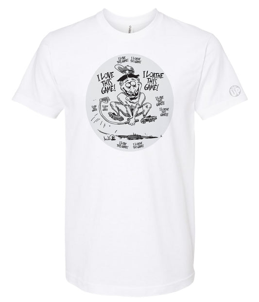vertical oval containing funny, wacky black and white illustration of golfer, "I love this game!" and "I loathe this game!" repeated in rough handwritten font on white t-shirt